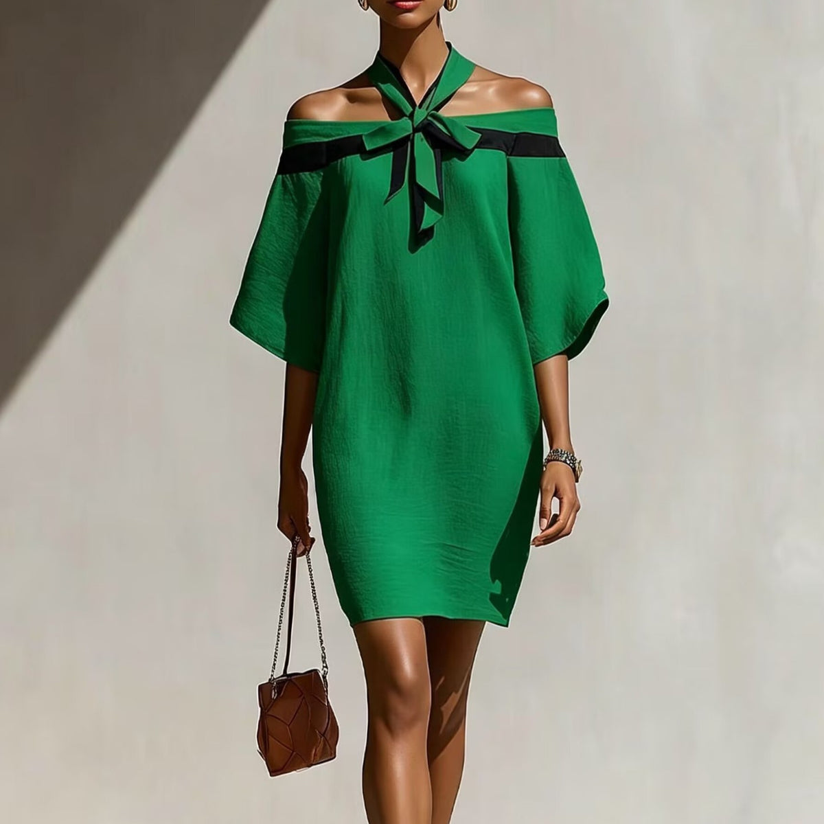 Vestido asimétrico con lazo en el escote