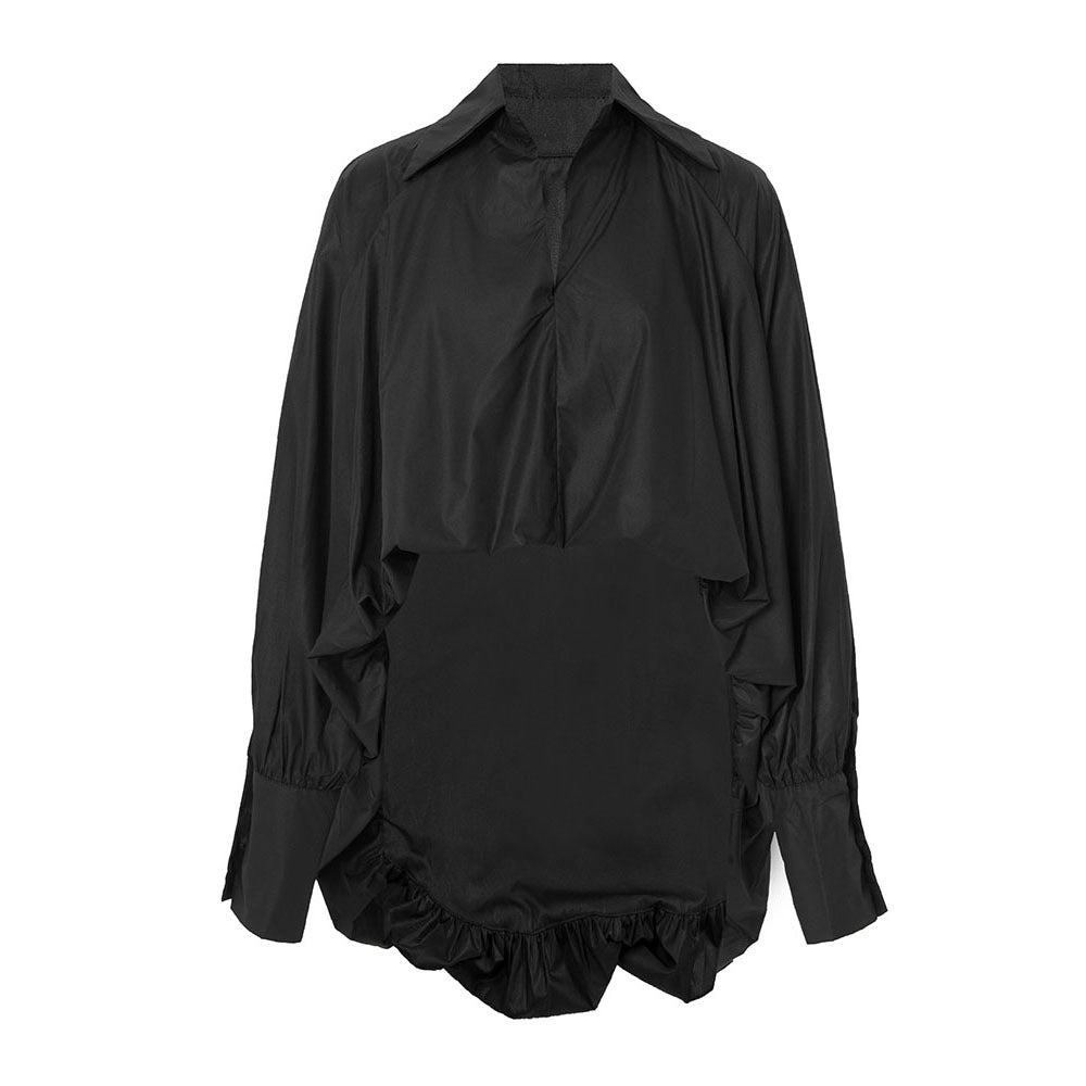 Camisa minimalista de manga larga y corte holgado