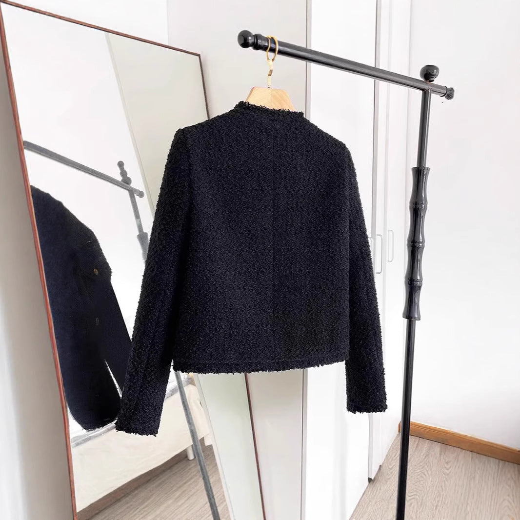 Blazer corto negro de tweed con manga larga