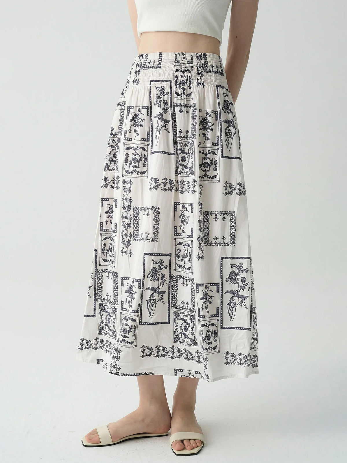 Falda midi estampada de cintura alta y corte evasé