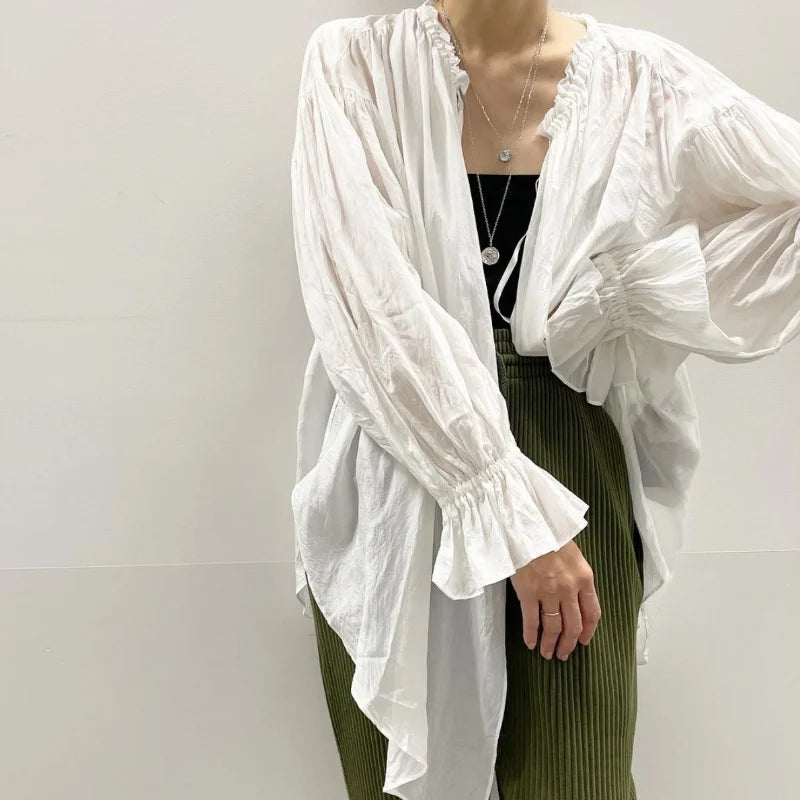 Blusa vintage con escote en V y lazada