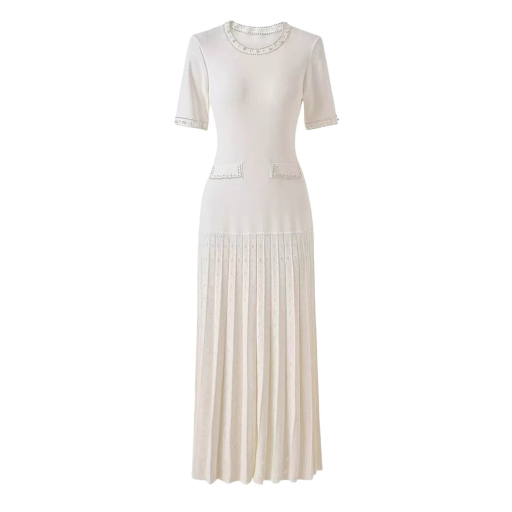 Vestido midi de punto con perlas y detalles calados
