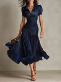 Vestido midi a rayas con cuello camisero