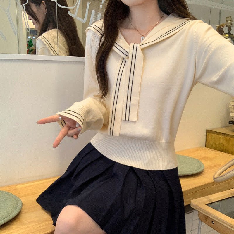Jersey largo de punto con cuello marinero y lazada