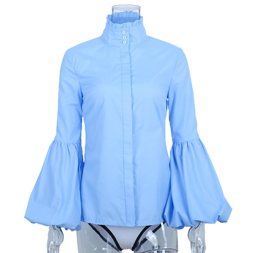 Blusa azul larga con manga farol