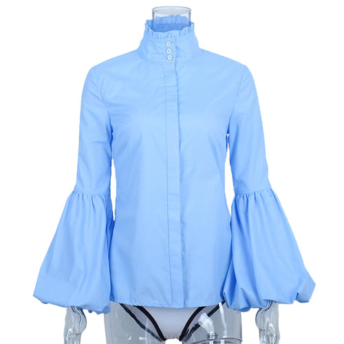 Blusa azul larga con manga farol