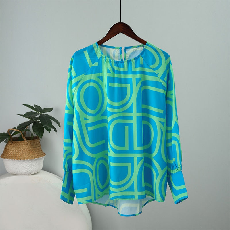 Blusa estampada holgada de manga larga