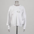Jersey de cuello redondo con flores en relieve