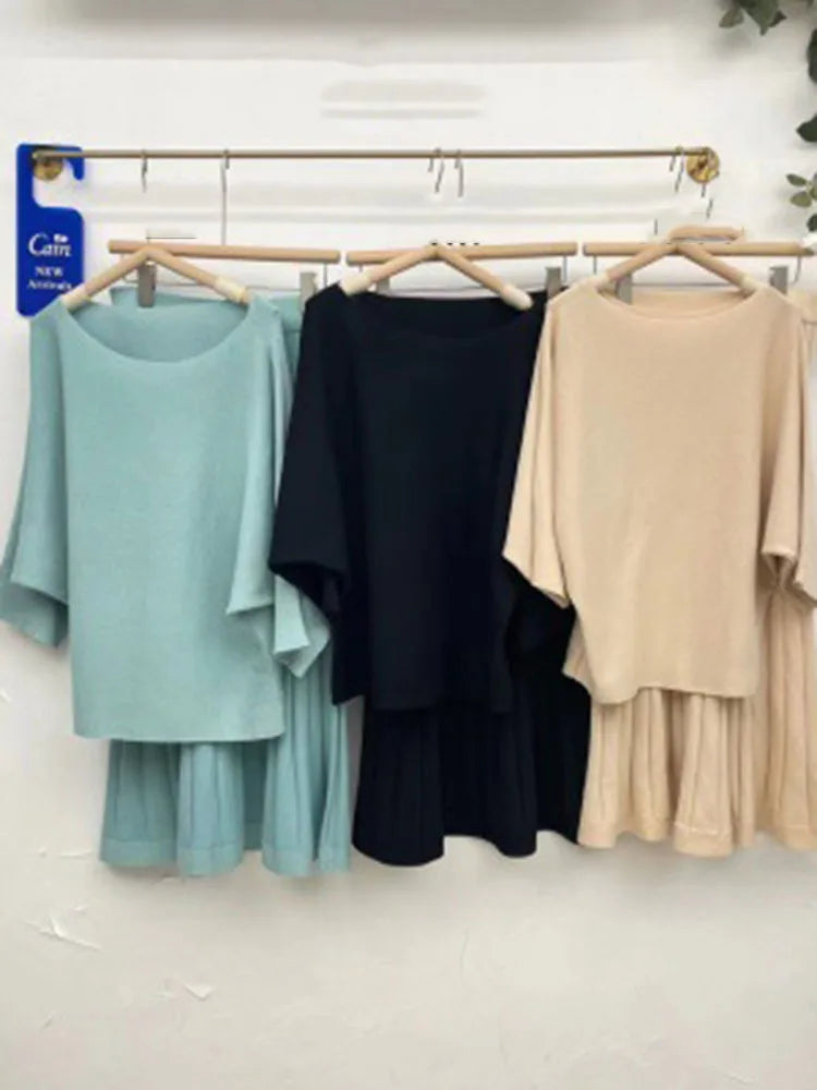 Conjunto de punto de jersey y falda plisada