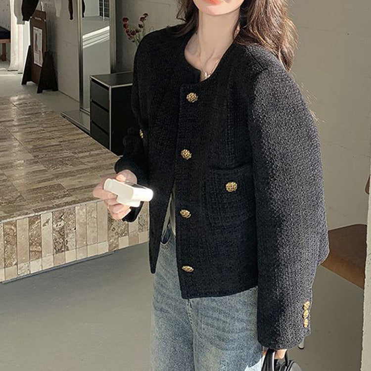 Chaqueta corta de tweed negra