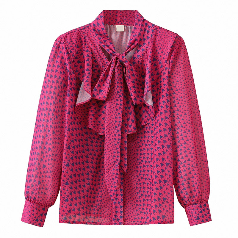 Blusa de gasa con lazada y volantes