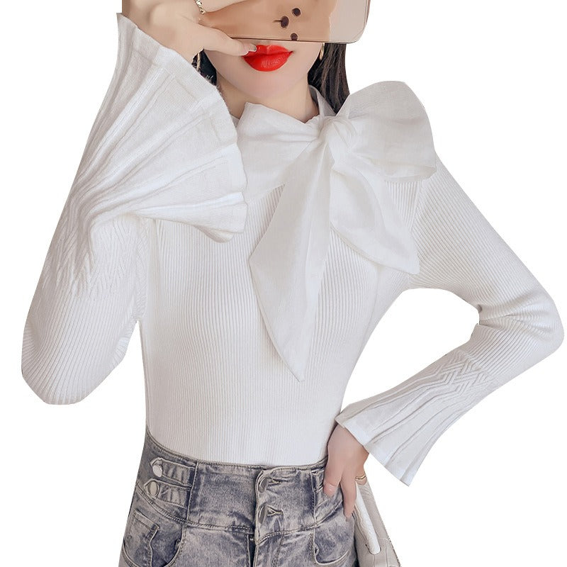 Jersey elegante con gran lazo y manga acampanada