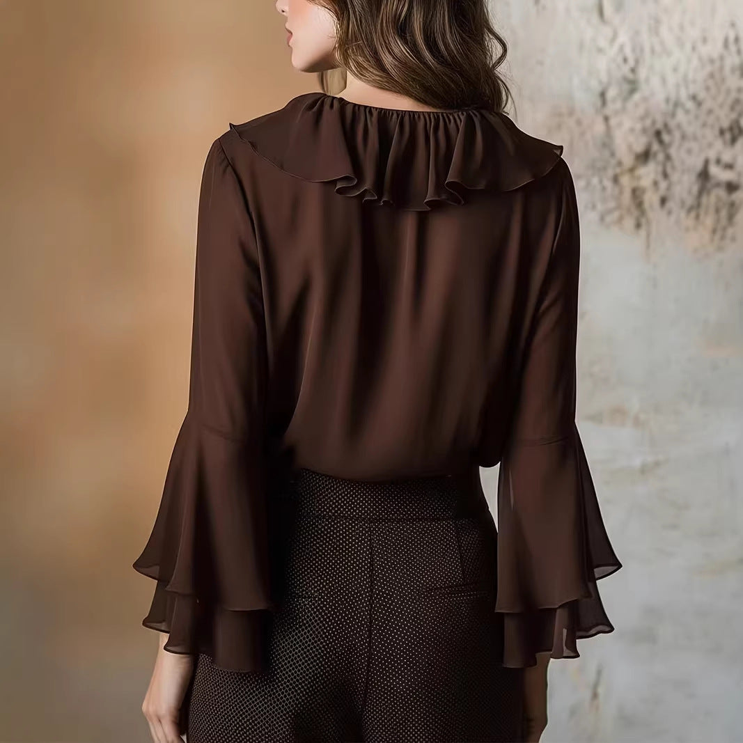 Blusa elegante con volantes, escote en V y manga larga