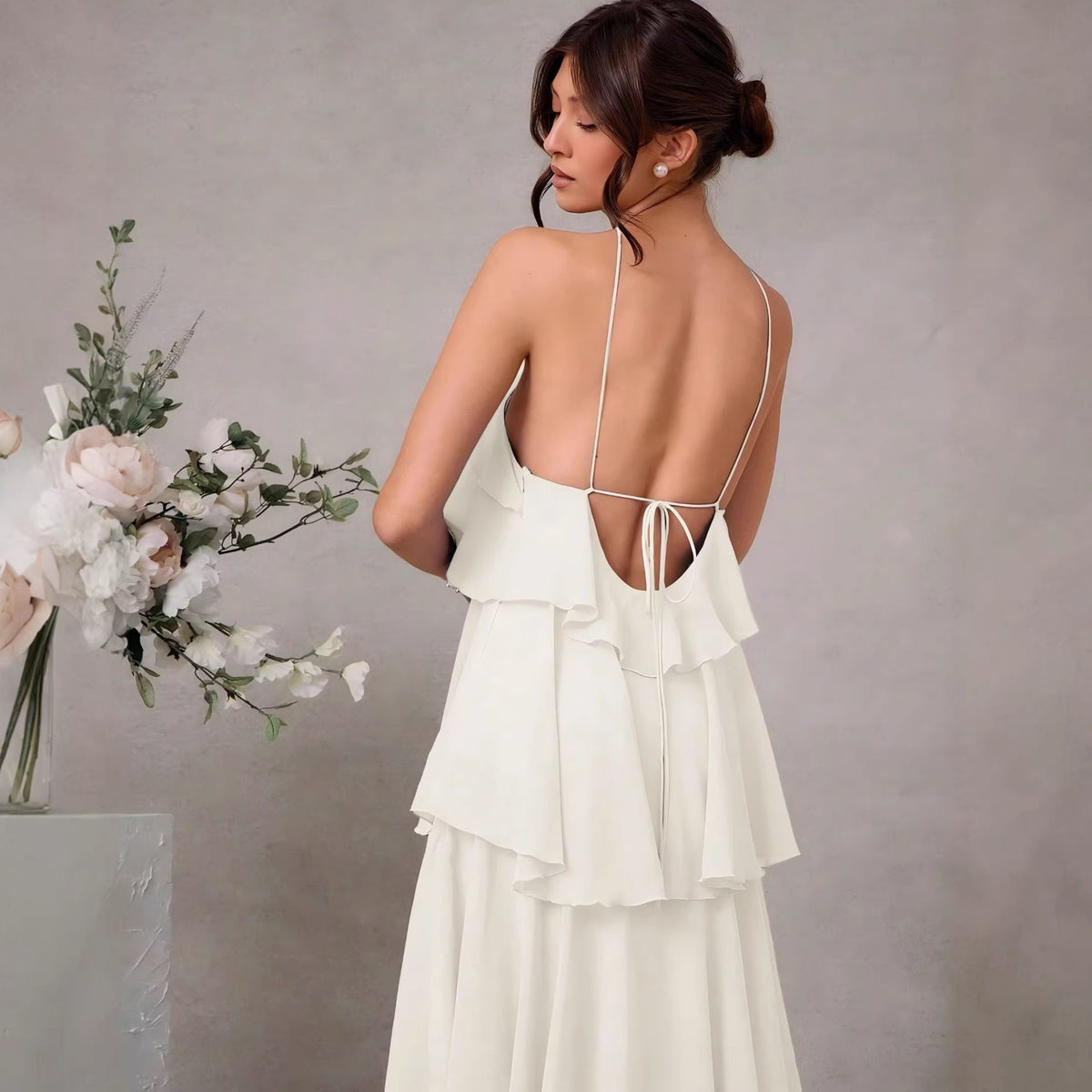 Vestido largo elegante sin mangas con cuello halter