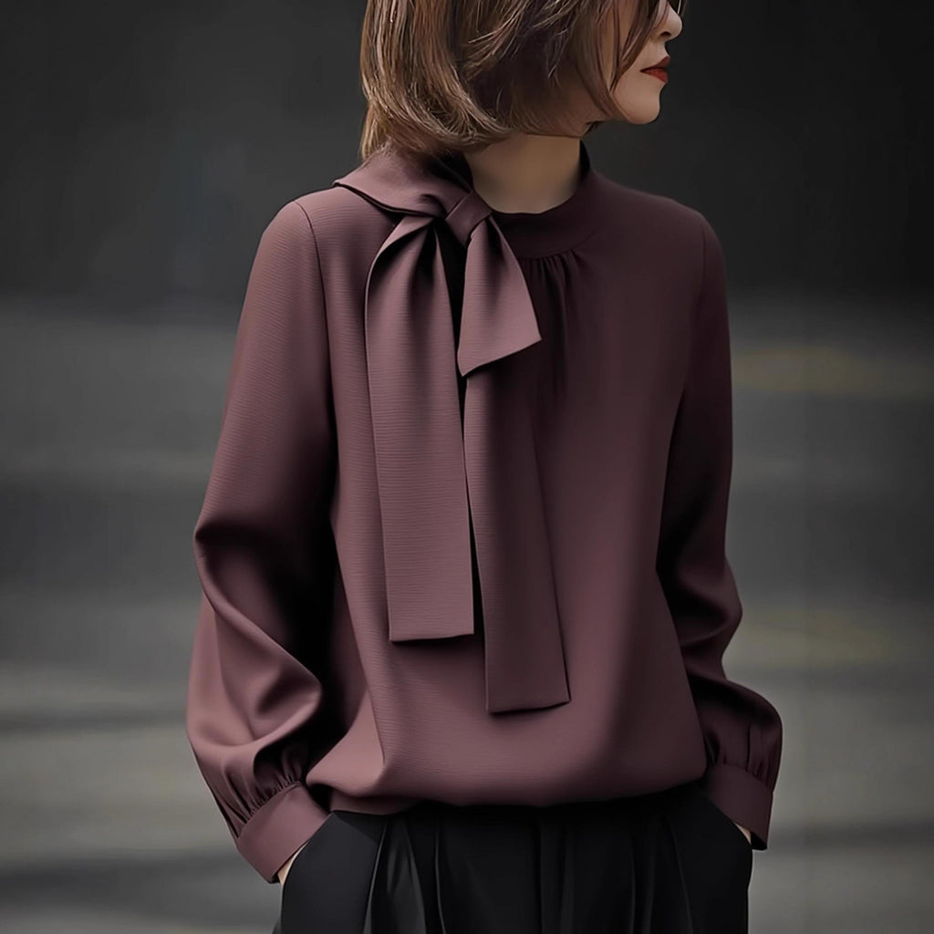 Blusa elegante de cuello alto y manga extralarga