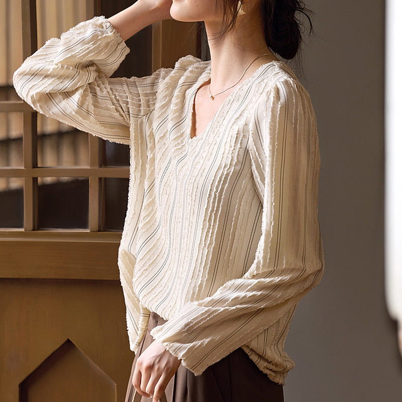 Blusa elegante de cuello texturizado