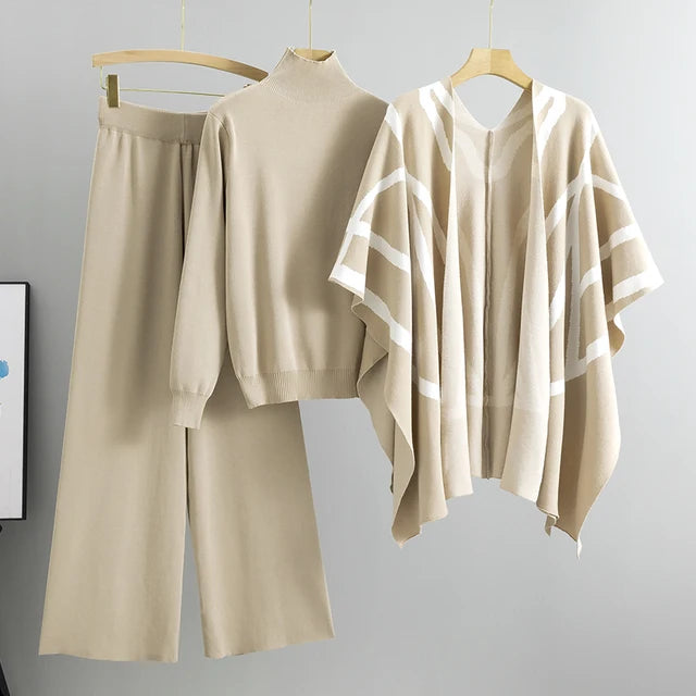 Conjunto de punto de tres piezas: chal de rayas, top de cuello alto y pantalón ancho