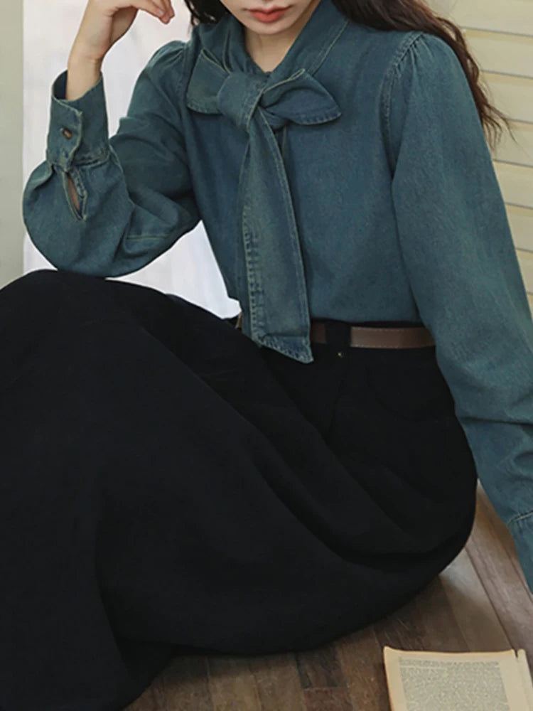Blusa vaquera elegante con lazo