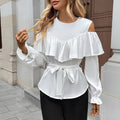 Blusa elegante con volantes y hombros descubiertos