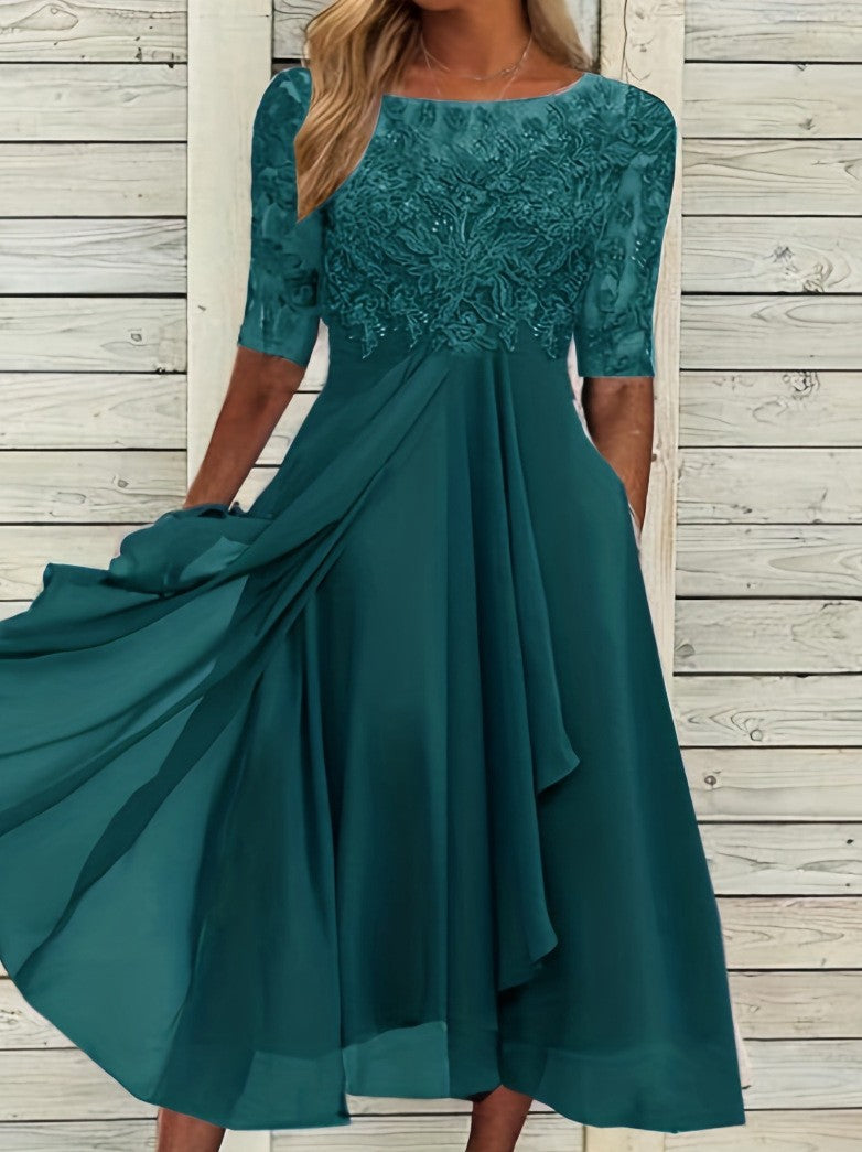Vestido largo de gasa y encaje con detalles calados