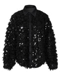 Blusa holgada con lentejuelas y manga larga