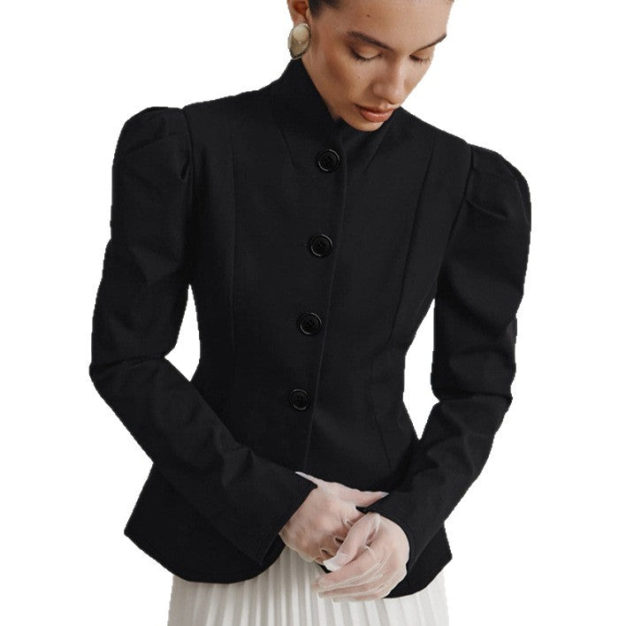 Abrigo elegante de entretiempo con mangas abullonadas