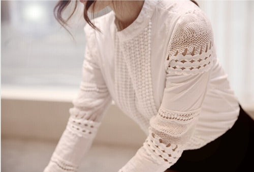 Blusa de encaje calado de manga larga