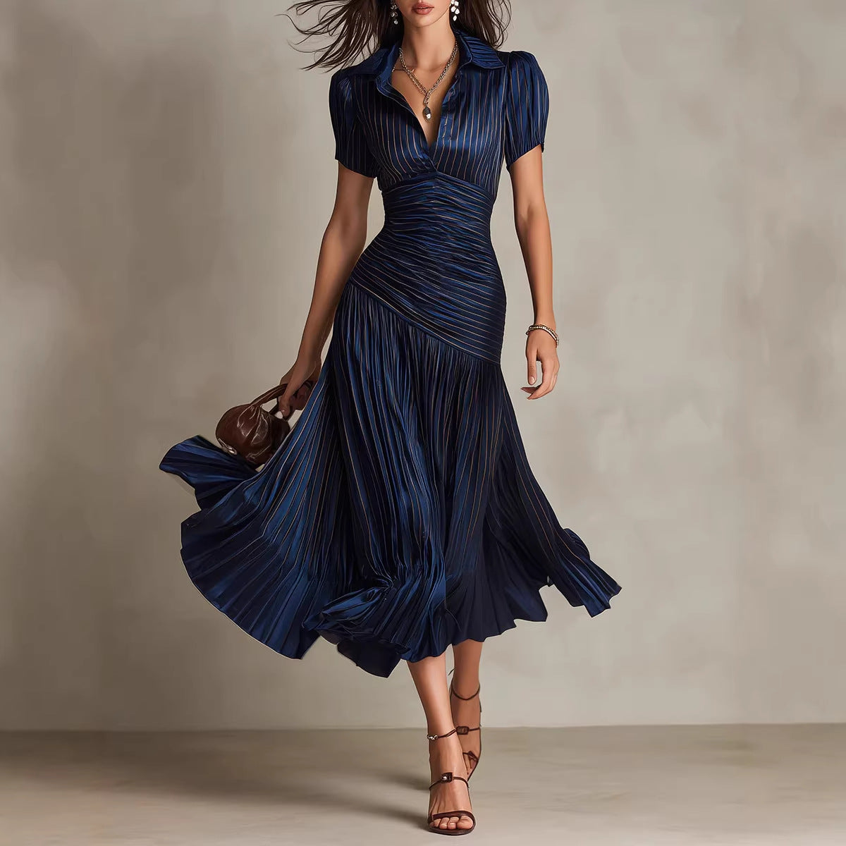 Vestido midi a rayas con cuello camisero