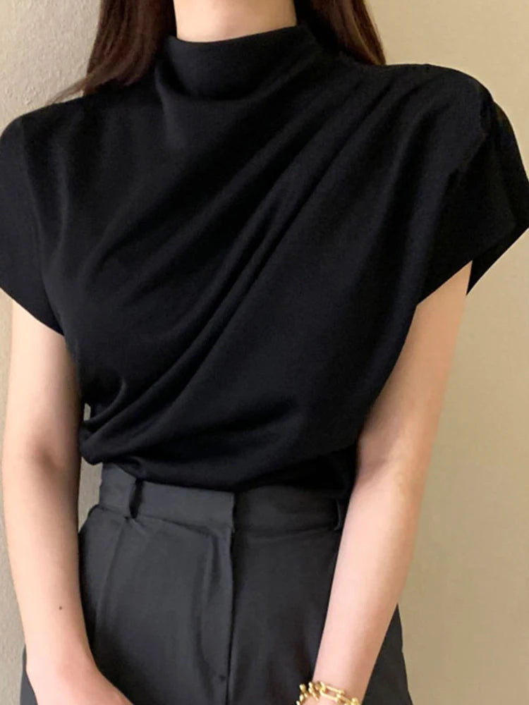 Blusa holgada de manga corta con cuello semialto