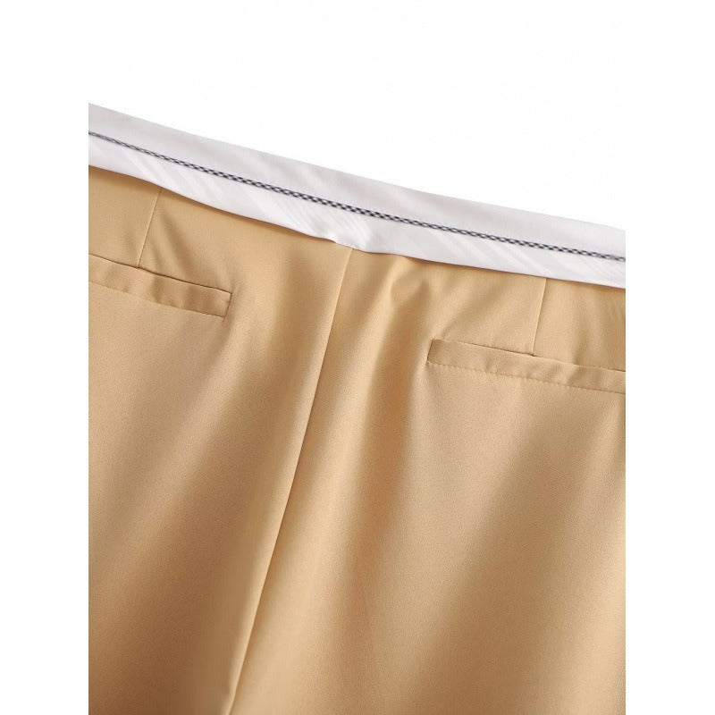 Pantalón ancho de tiro alto con detalle de pliegue en la cintura