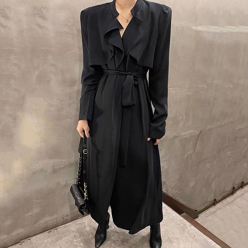 Vestido midi cruzado con volantes y lazada