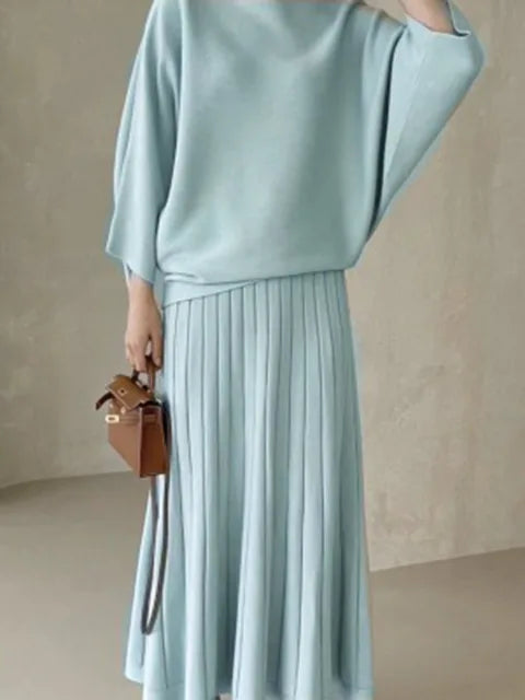Conjunto de punto de jersey y falda plisada