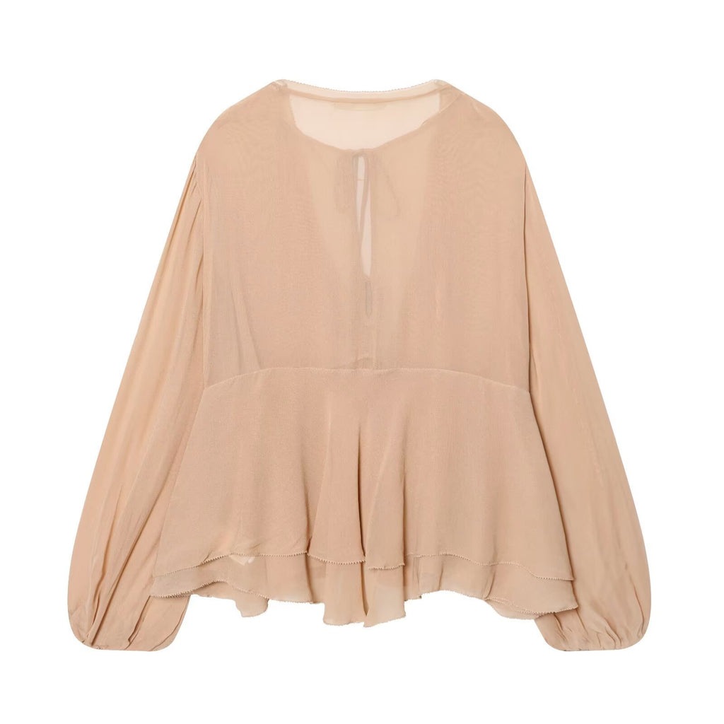 Blusa holgada de manga larga con cuello de volantes