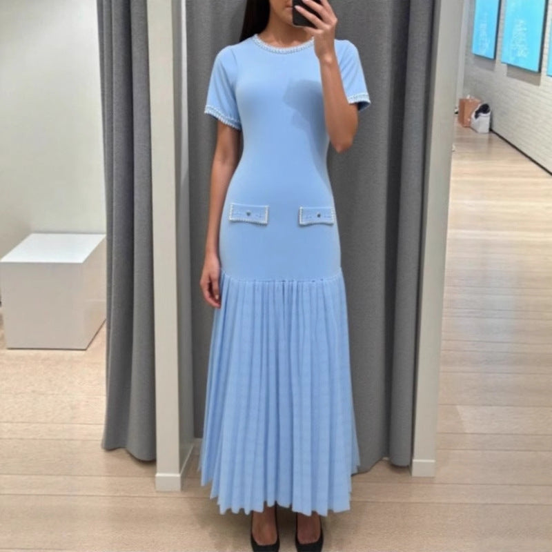 Vestido midi de punto con perlas y detalles calados