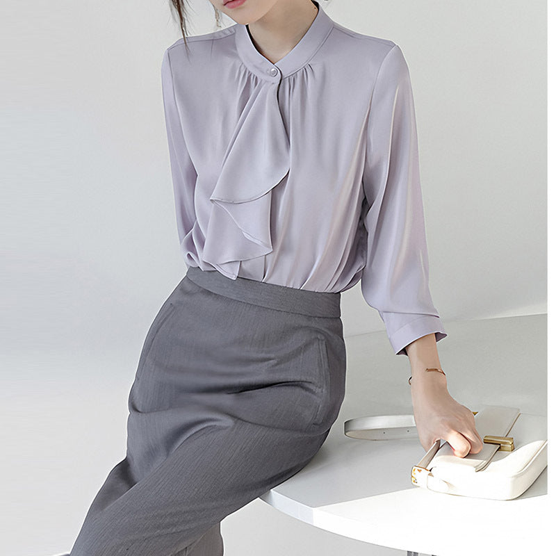 Blusa morada de manga larga con lazo
