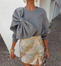 Blusa holgada de manga larga con lazo