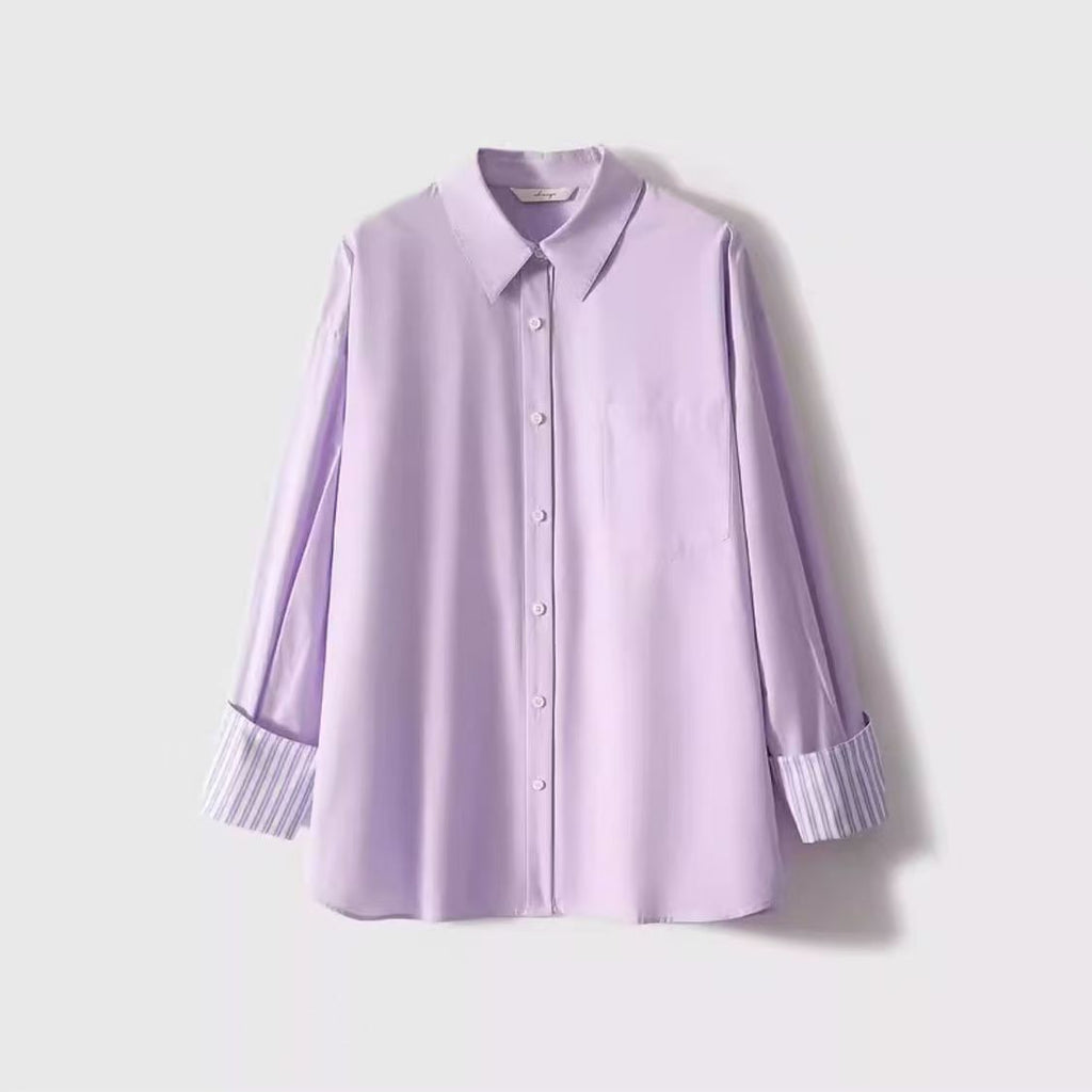 Camisa morada de rayas con manga larga y corte holgado