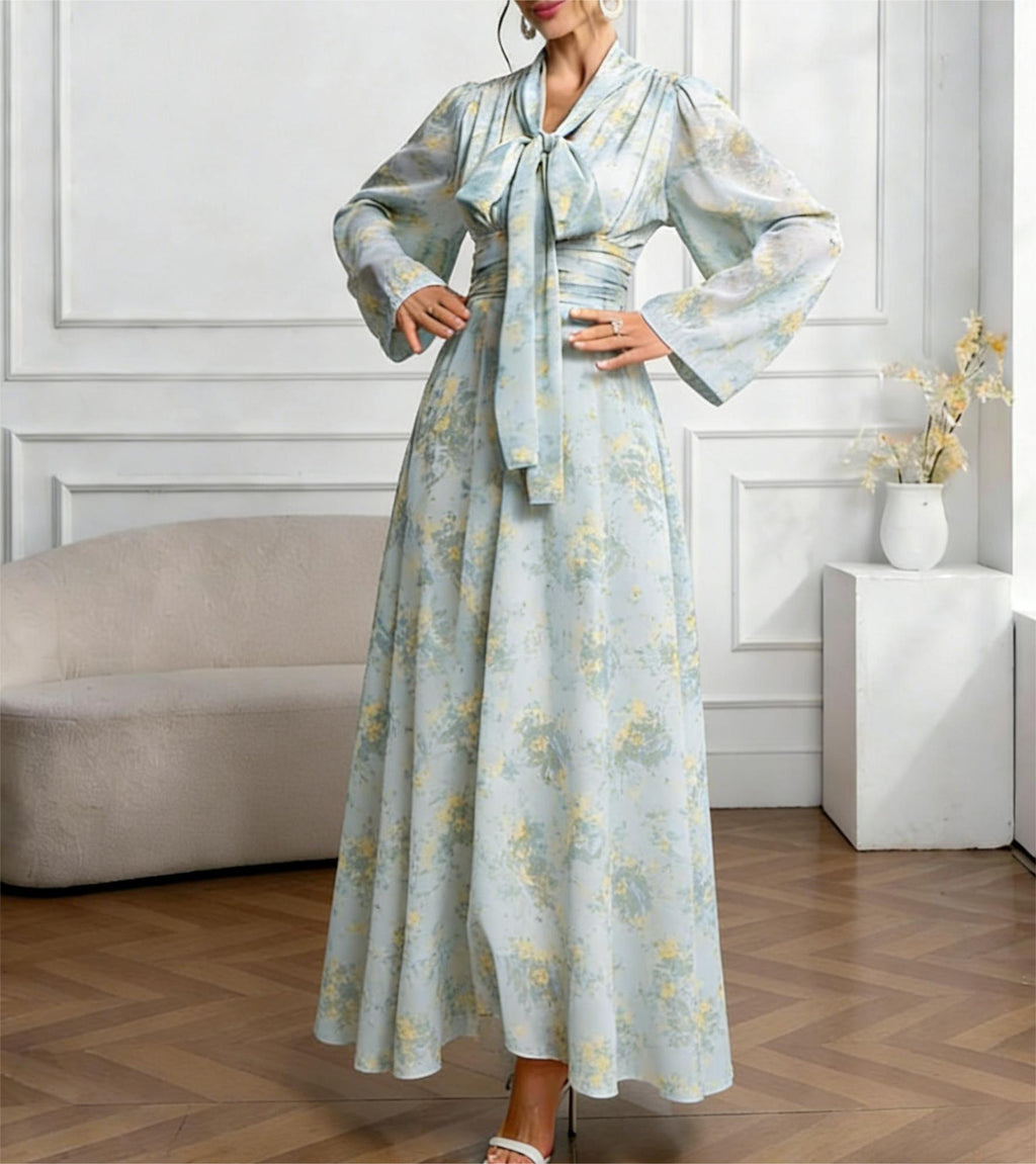 Vestido largo floral de manga larga con lazada en la cintura