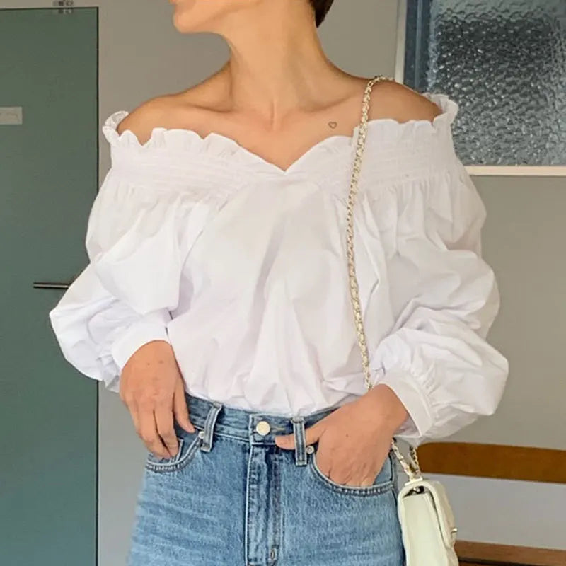 Blusa de hombros descubiertos con manga farol
