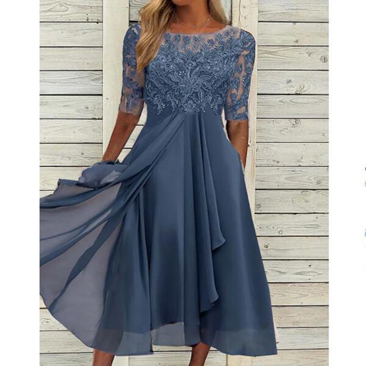 Vestido largo de gasa y encaje con detalles calados