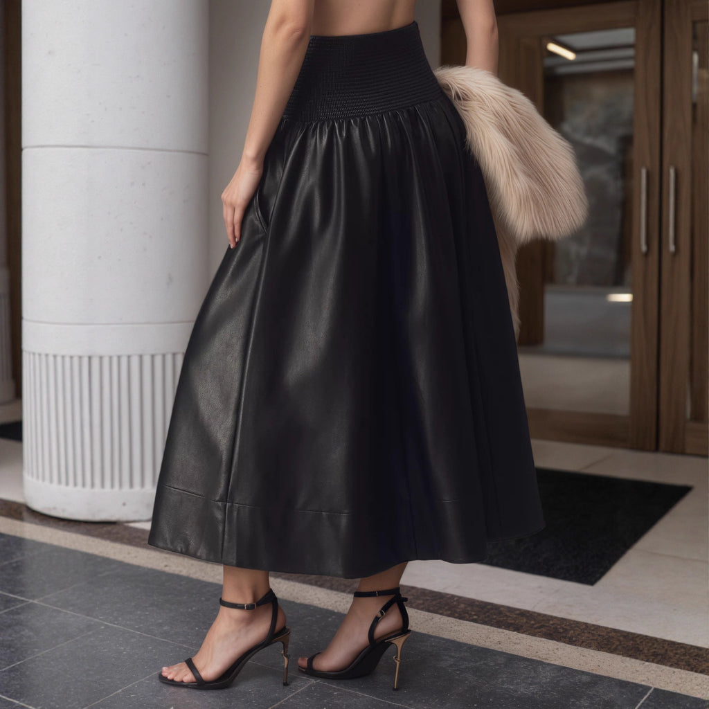 Falda midi negra de cintura alta