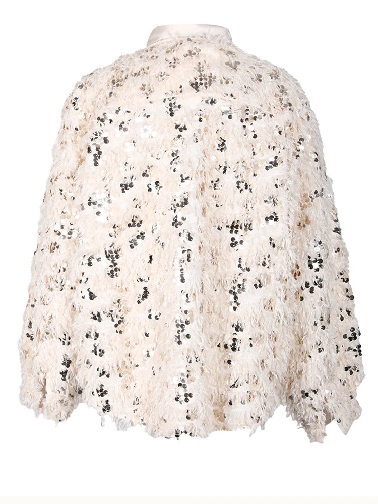 Blusa holgada con lentejuelas y manga larga