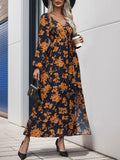 Vestido midi estampado cruzado con abertura y manga larga