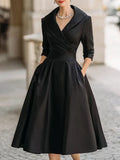 Vestido largo formal entallado de manga larga con cuello camisero