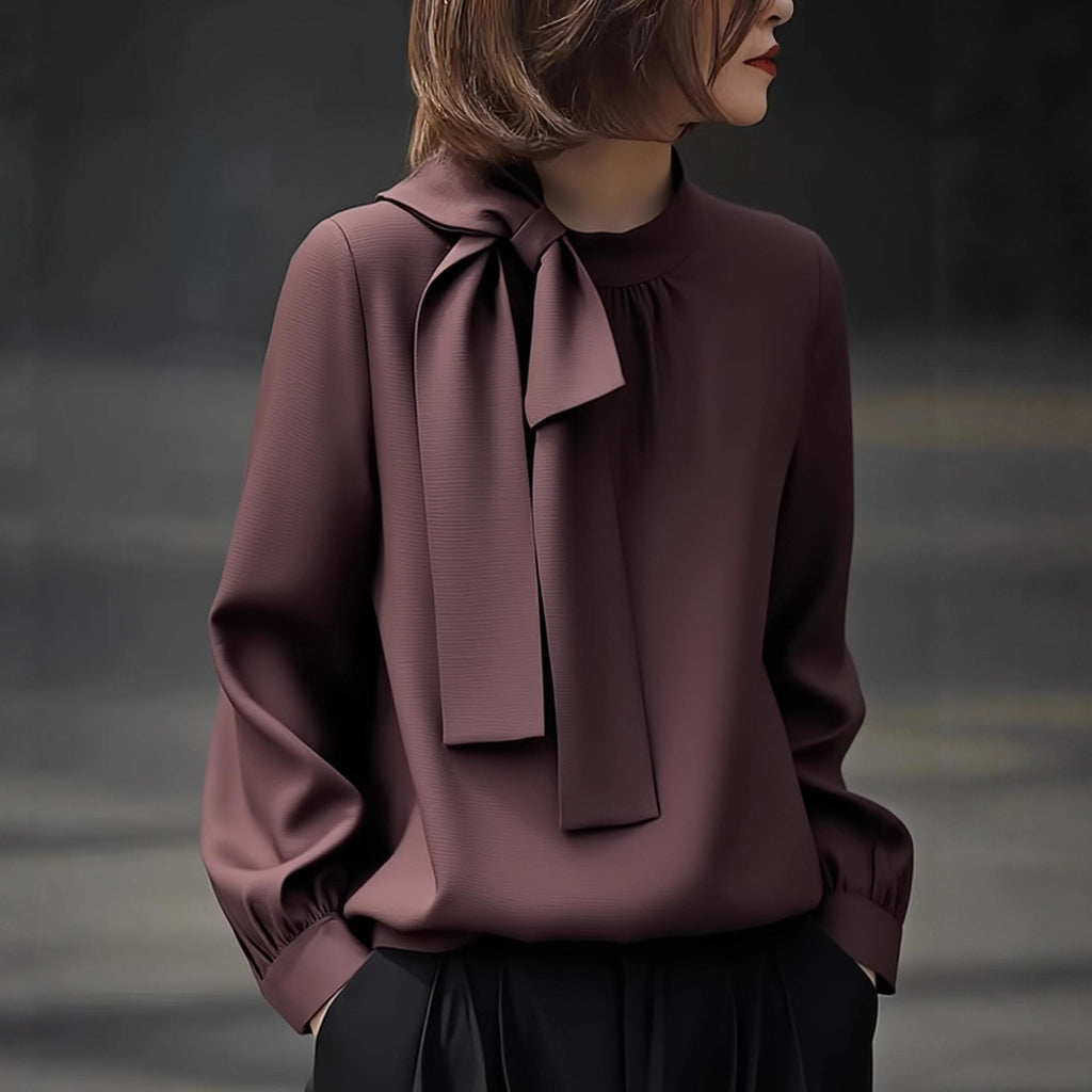 Blusa elegante de cuello alto y manga extralarga