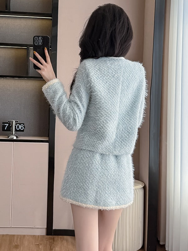 Conjunto azul de blazer y falda de cintura alta