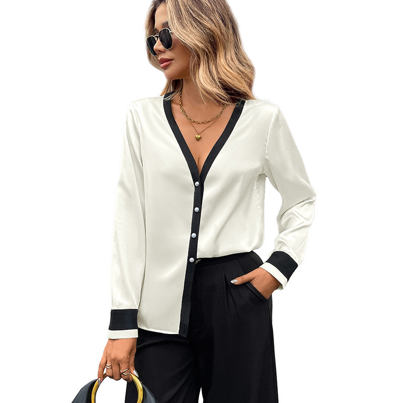 Camisa elegante con botones de perla y escote en V
