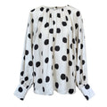 Blusa satinada de lunares con manga farol