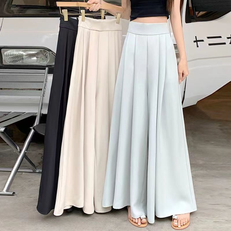 Pantalón falda ancho y fluido de tiro alto