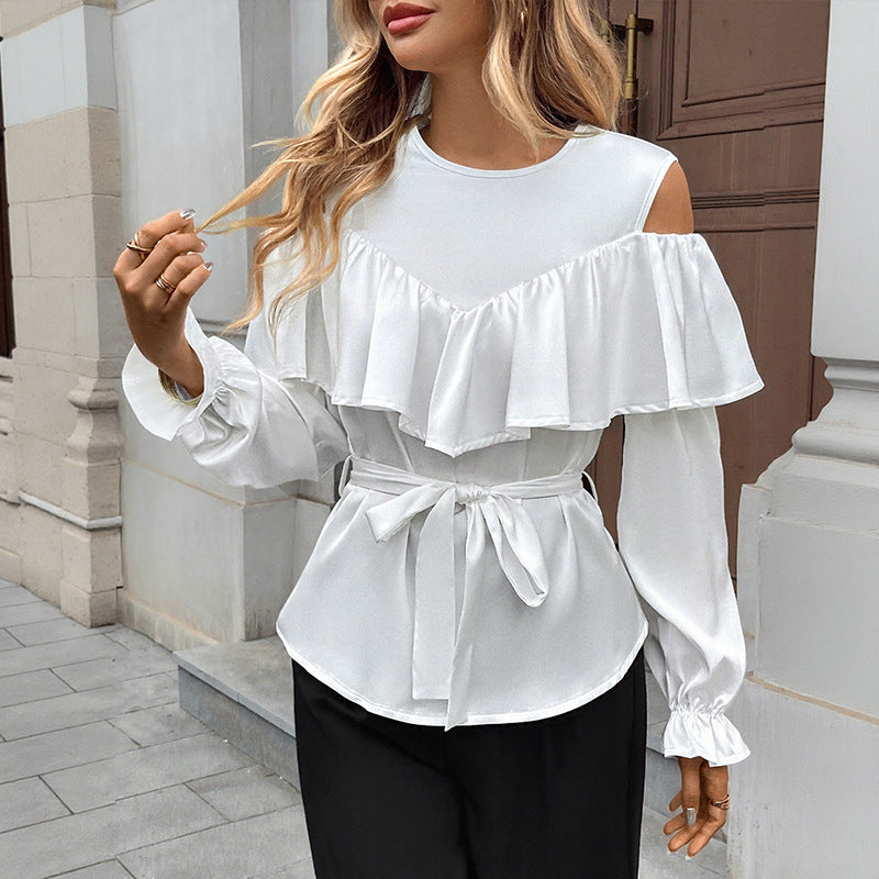Blusa elegante con volantes y hombros descubiertos